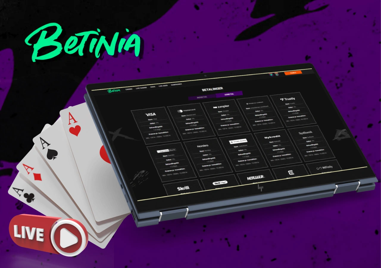 Oversigt over tilgængelige betalingsmetoder hos Betinia live casino vist på laptop med spillekort i forgrunden